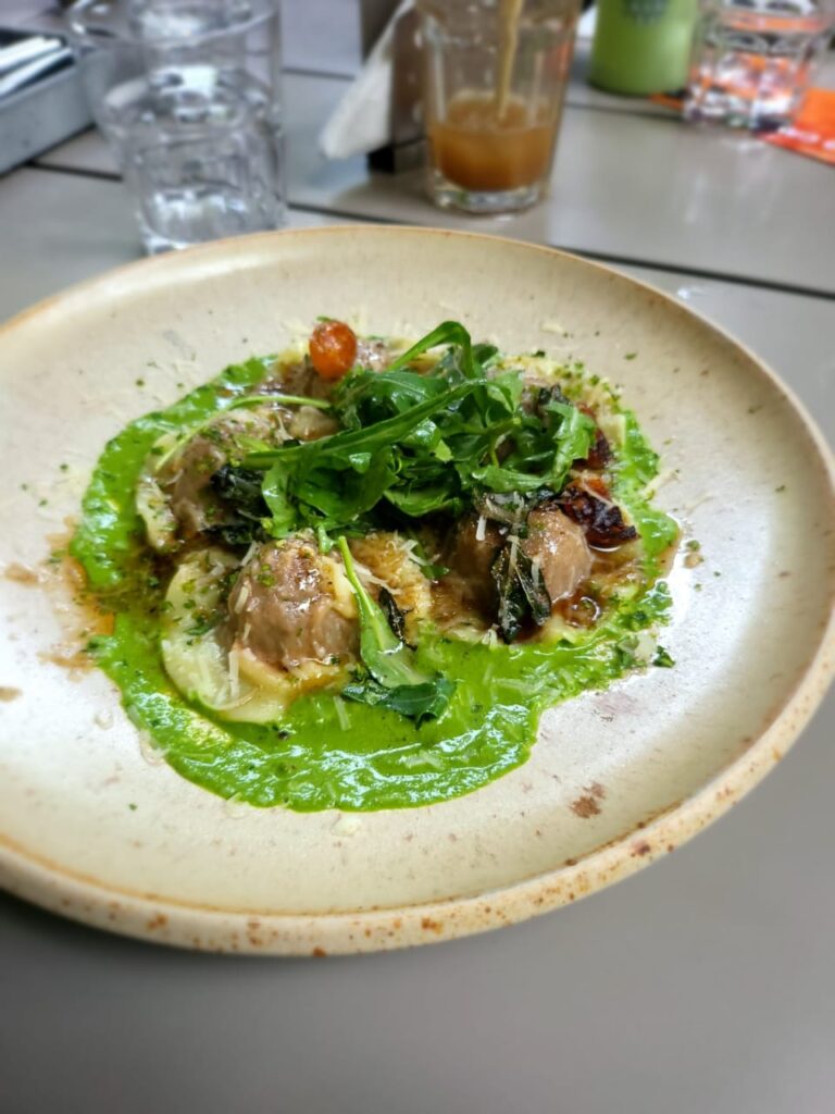 sundried tomato ravioli with a basil pesto