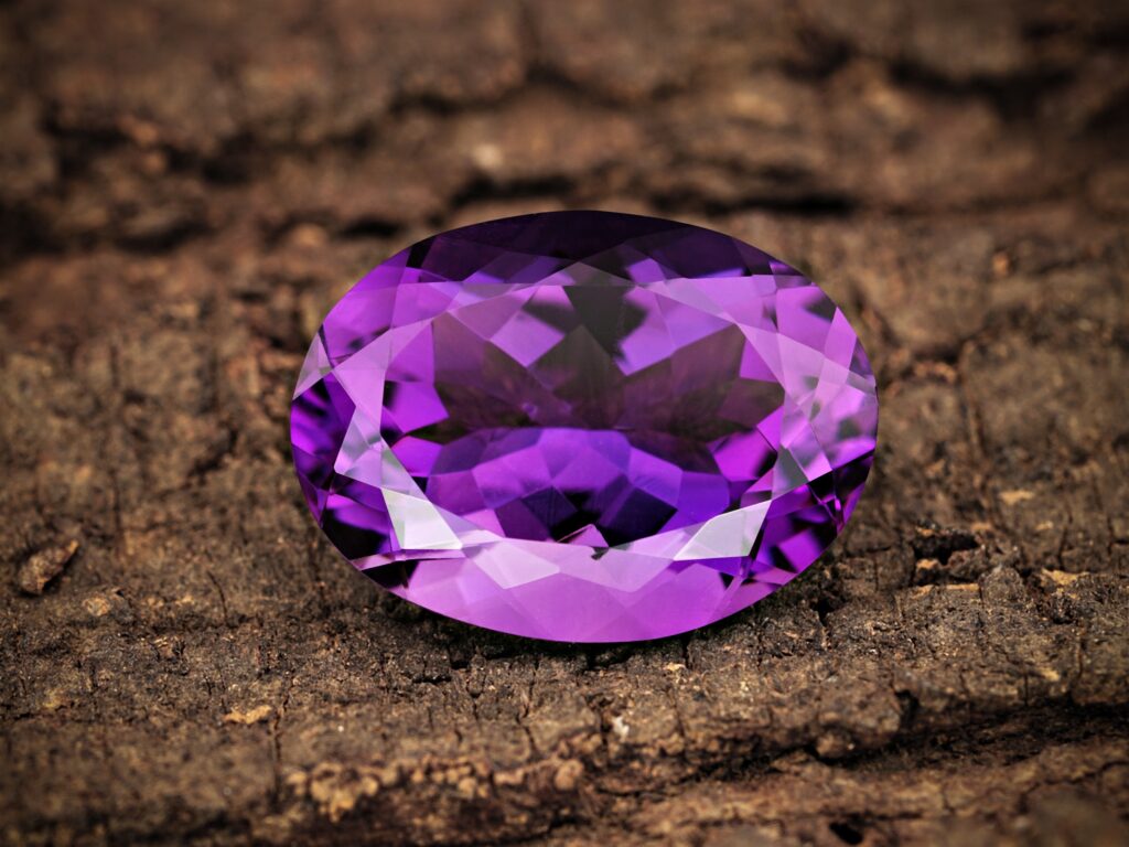 an image of an amethyst on wood