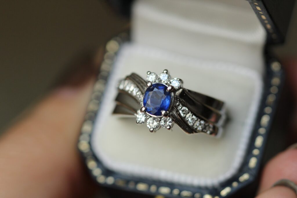 an image of a sapphire ring in a box