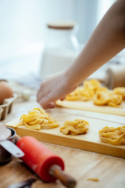 Fresh pasta being prepared in a kitchen. Photo: Katerina Holmes / Pexels.