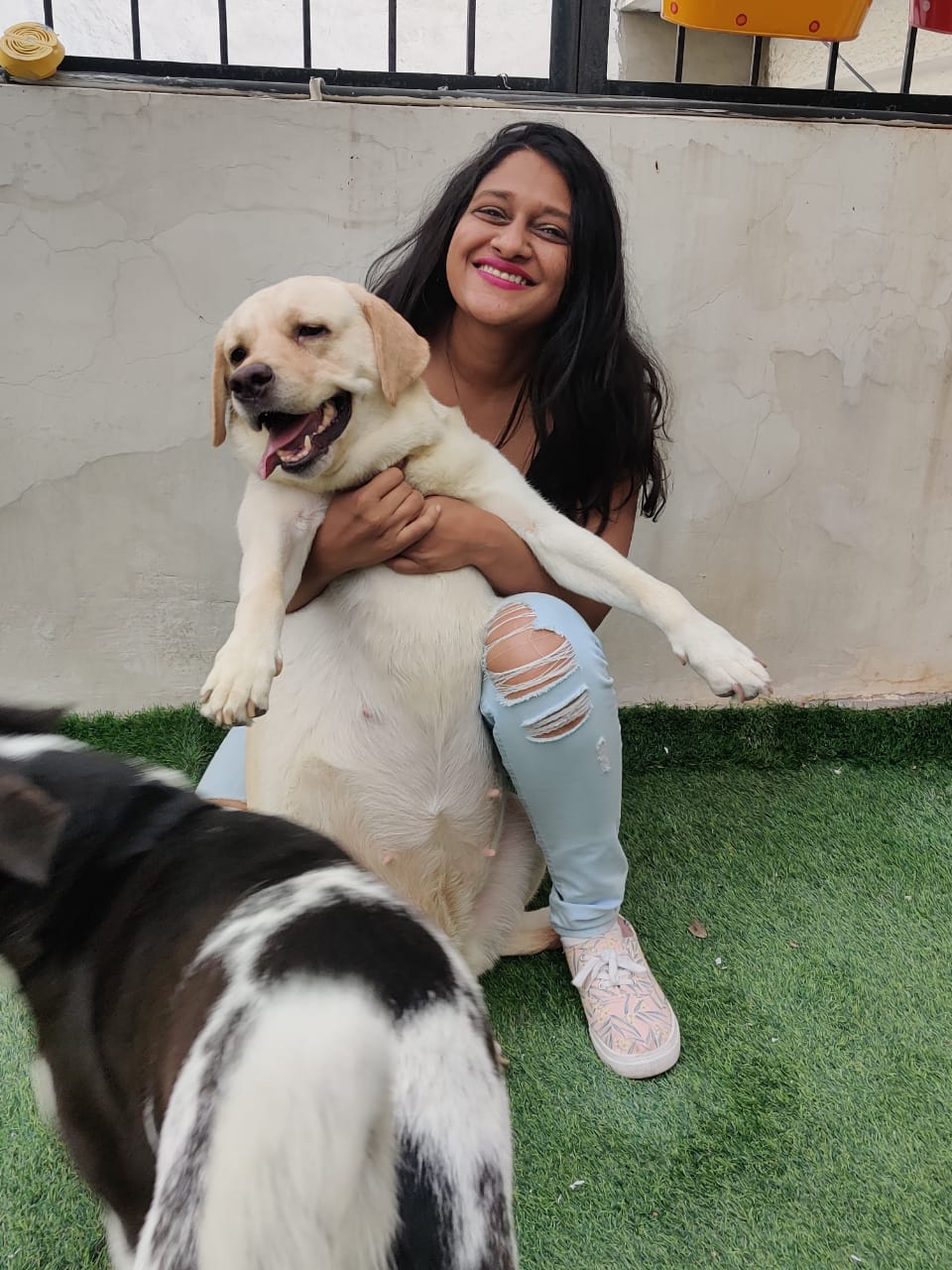 Meetali with her dogs